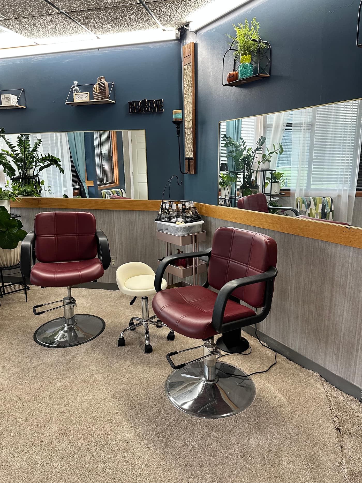 Styling chair and mirror at Nia's Crown Salon